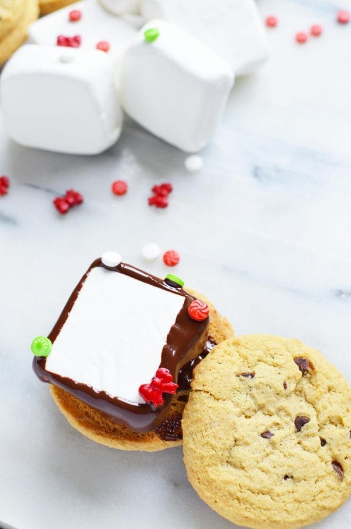 Holiday candy dipped cookie marshmallow sandwiches recipe