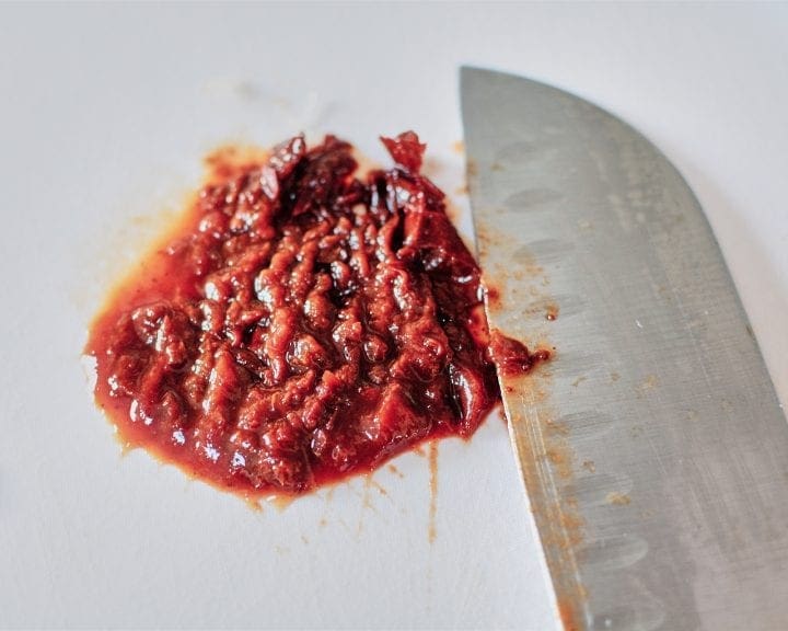 cutting chipotle peppers